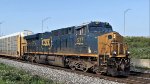 CSX 977 leads M214.